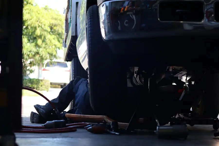 Mechanic working under a lorry