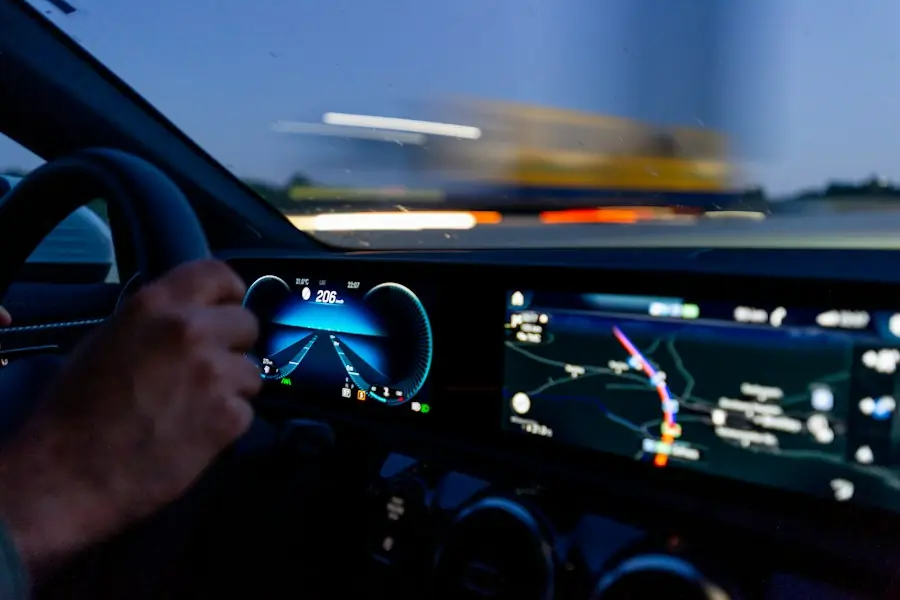 Driver’s hands on the wheel with the dashboard lit